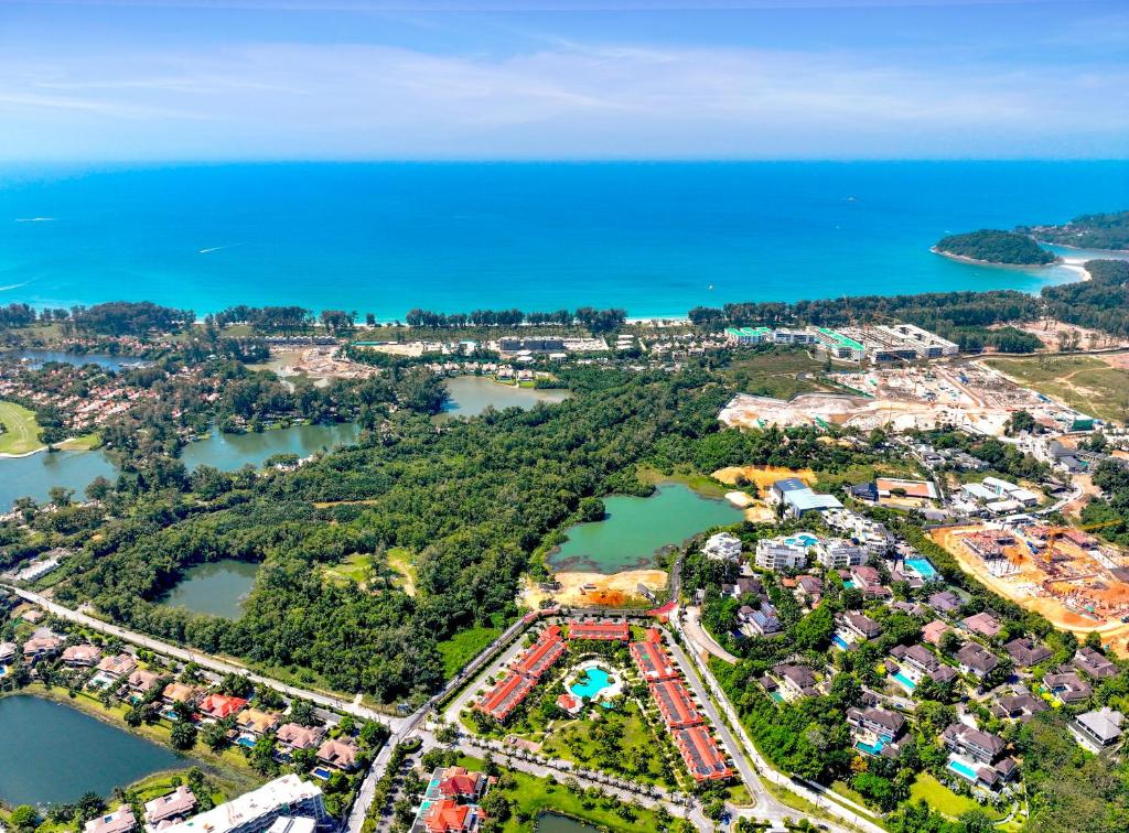 an aerial view of a resort next to the water at Luxury Pool Villa Laguna Resort Near Layan Beach - 2 bedrooms 6 people in Layan Beach