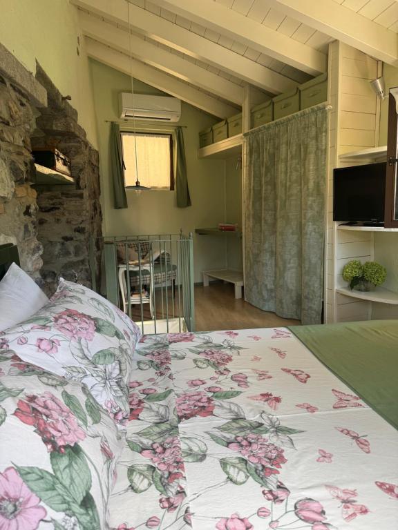 Ένα ή περισσότερα κρεβάτια σε δωμάτιο στο Castagna Holiday Home