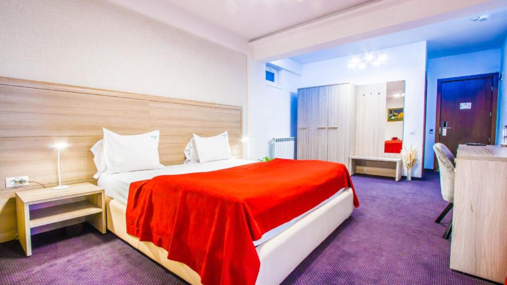 Un pat sau paturi într-o cameră la Parliament Square