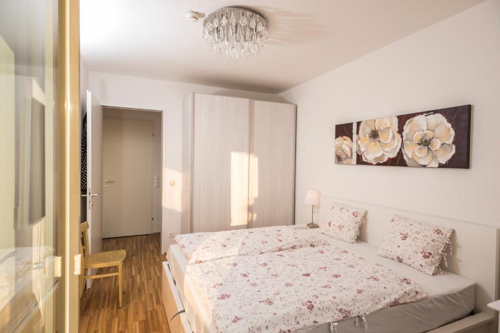 Postel nebo postele na pokoji v ubytování Sky View Apartment Vienna