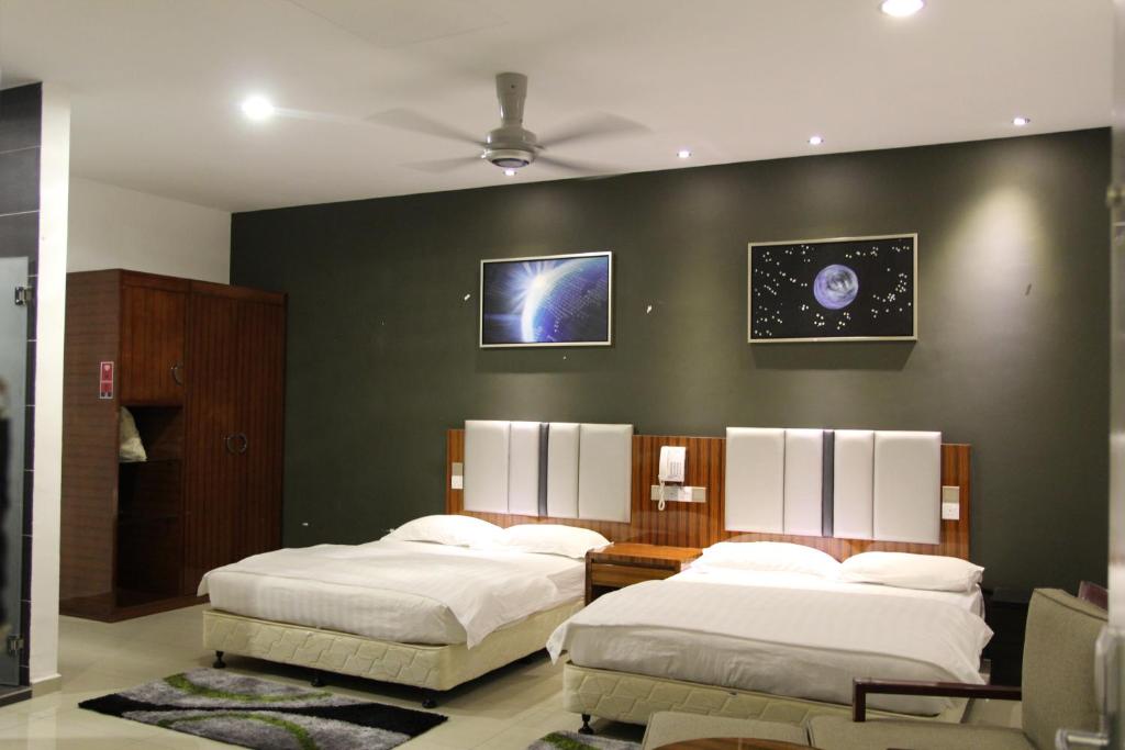 Postelja oz. postelje v sobi nastanitve M Design Hotel @ Seri Kembangan