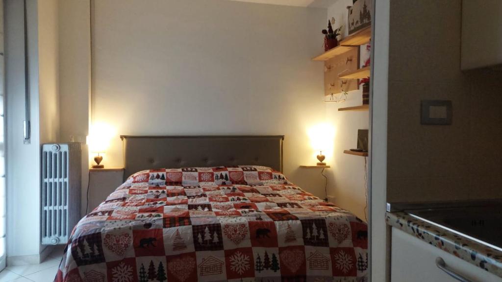 Ένα ή περισσότερα κρεβάτια σε δωμάτιο στο Il Mughetto