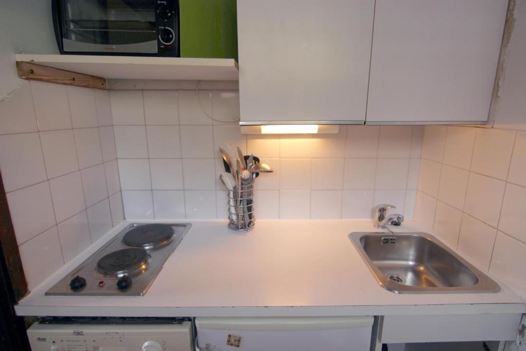 Kuchyň nebo kuchyňský kout v ubytování Dôme de Polset Appartements VTI