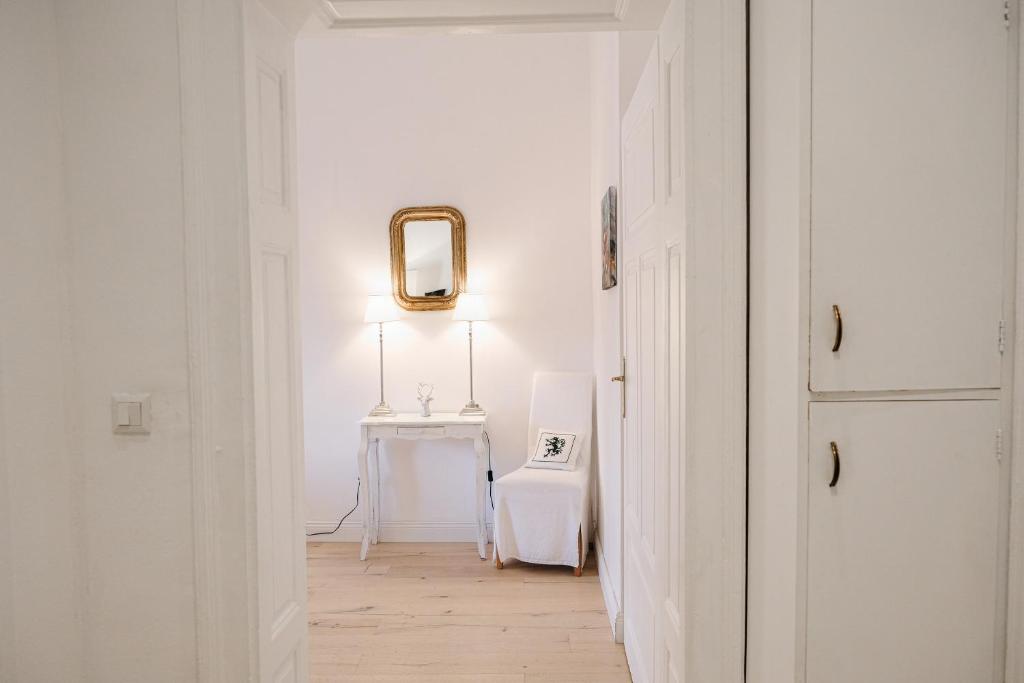 Una cama o camas en una habitación de Altstadt Elegance