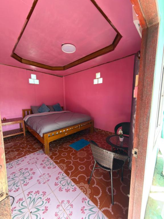 Giường trong phòng chung tại Danai Guesthouse