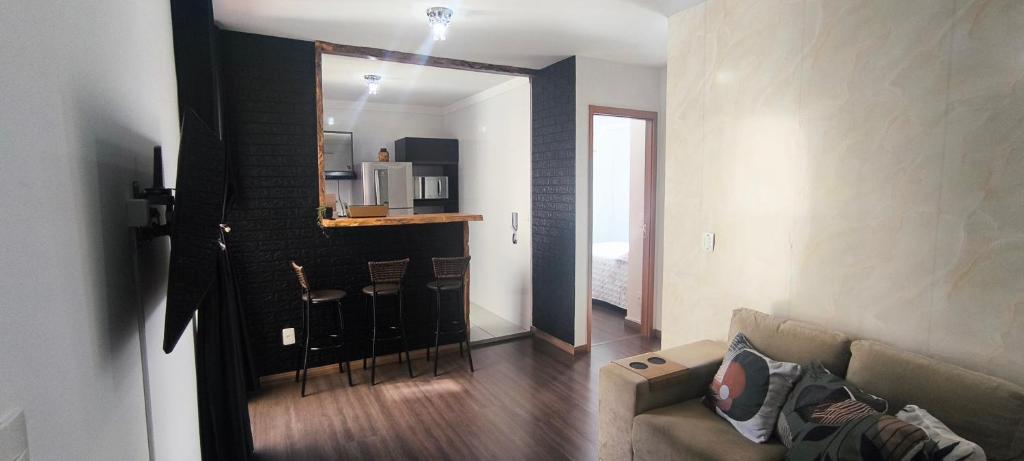 Een zitgedeelte bij Refúgio Premium UTFPR