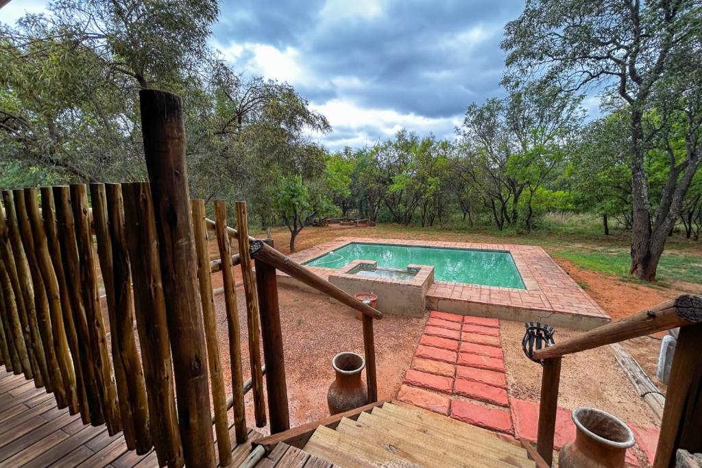 Πισίνα στο ή κοντά στο Elements Bush Villa 18