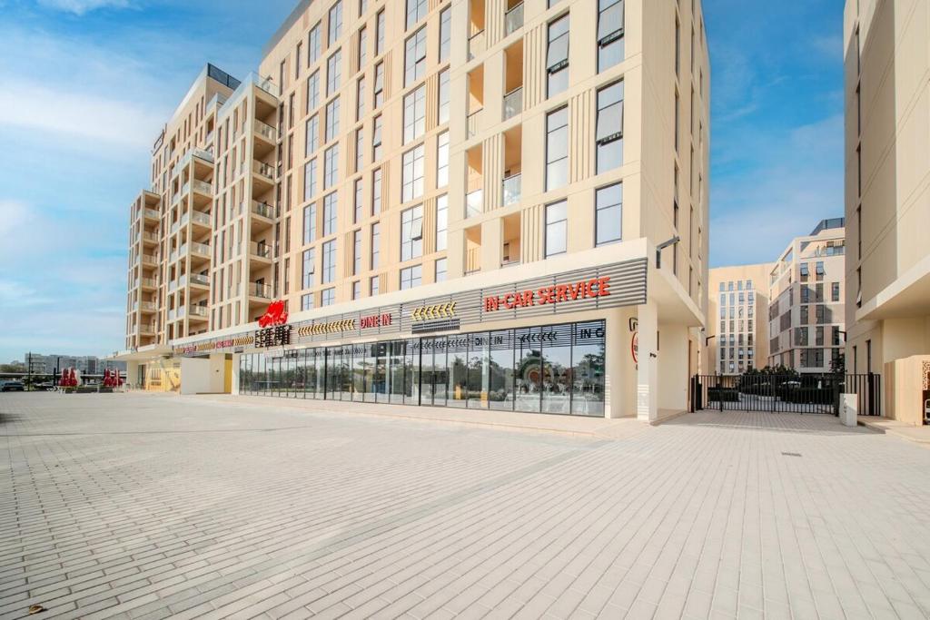 لابی و فضای عمومی 1BR With Living - Poolview Apt - Alef Al Mamsha - تصویر ۵