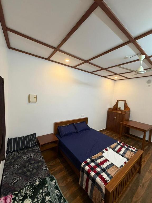 Postel nebo postele na pokoji v ubytování Happy Stays