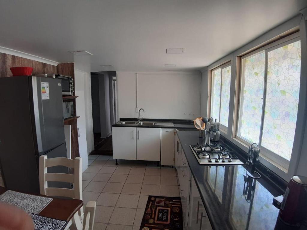 Kuchyň nebo kuchyňský kout v ubytování Departamento viña del mar cercano a mall y playa