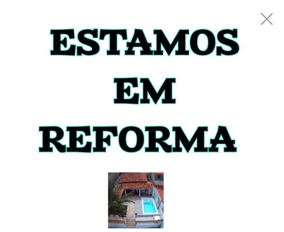 an image of a house with the words esamos and emrrr at Casa Brisa de Verão Jauá in Camaçari