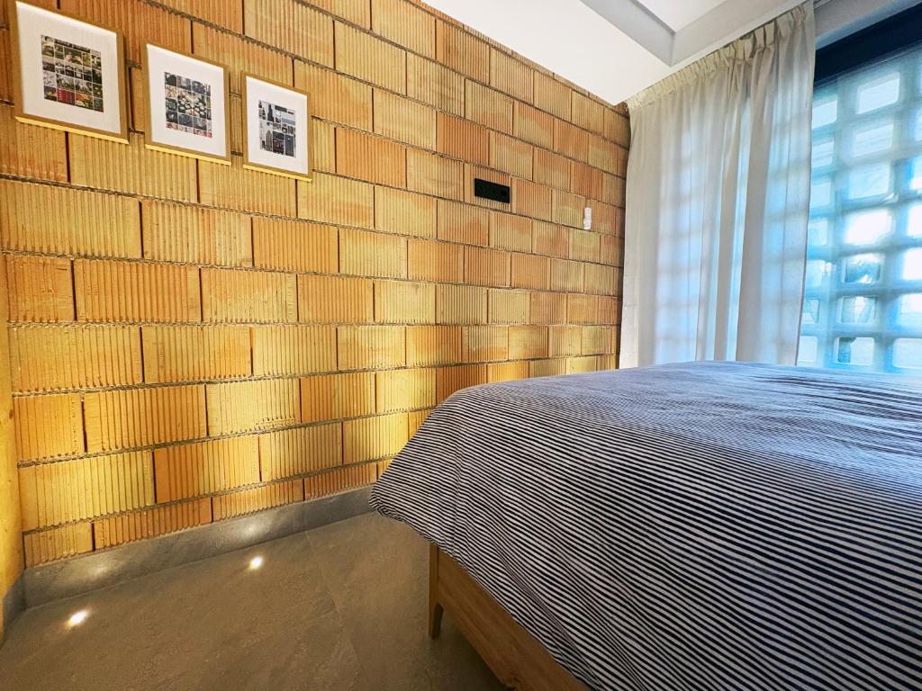 En eller flere senge i et værelse på Viviendas El Tiburón