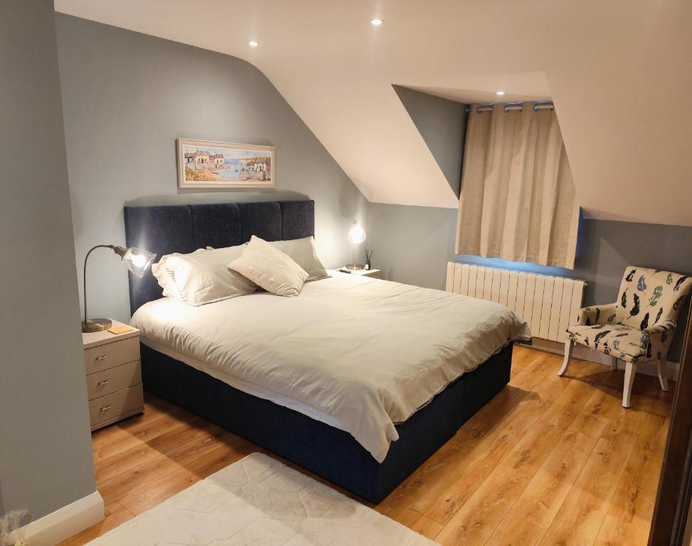 Postel nebo postele na pokoji v ubytování Suíomh Álainn