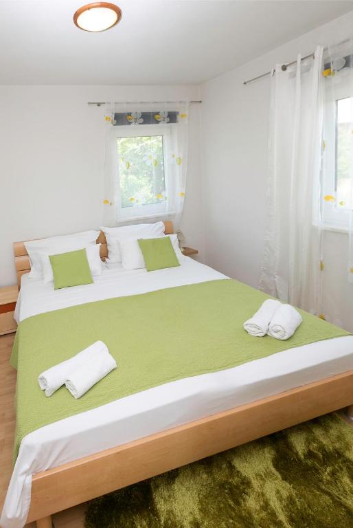 Postel nebo postele na pokoji v ubytování Villa Oleander