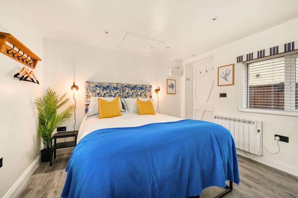 Ένα ή περισσότερα κρεβάτια σε δωμάτιο στο Stone's Throw