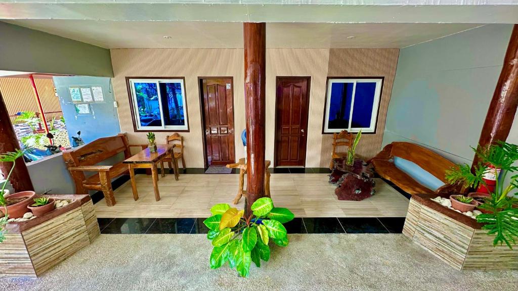 Khu vực ghế ngồi tại Indino Guest House