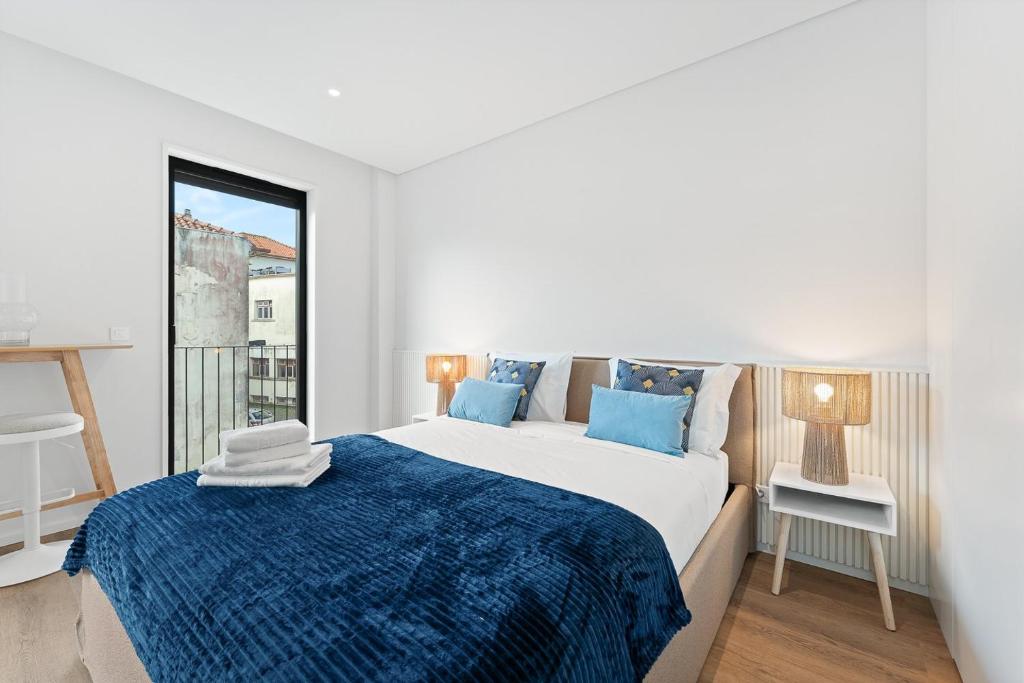 Postel nebo postele na pokoji v ubytování GuestReady - Cravo