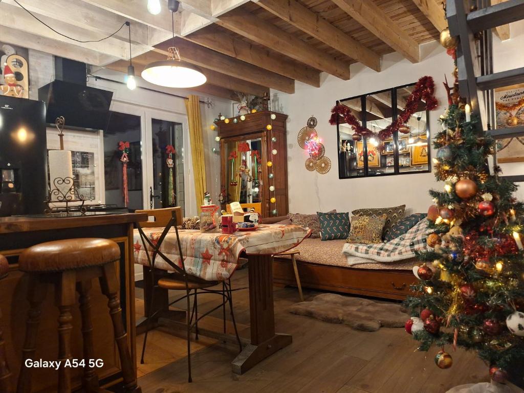 Χώρος καθιστικού στο Gîte cosy Le Relais de la Baie