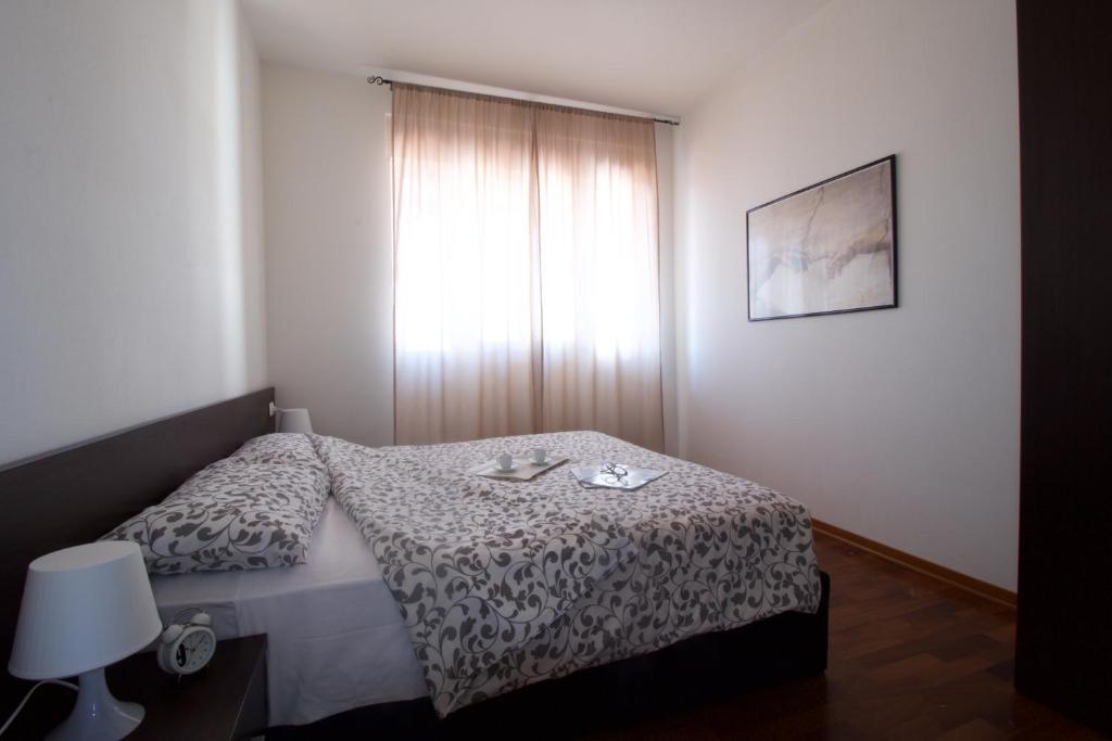 Posteľ alebo postele v izbe v ubytovaní Residence Le Terrazze