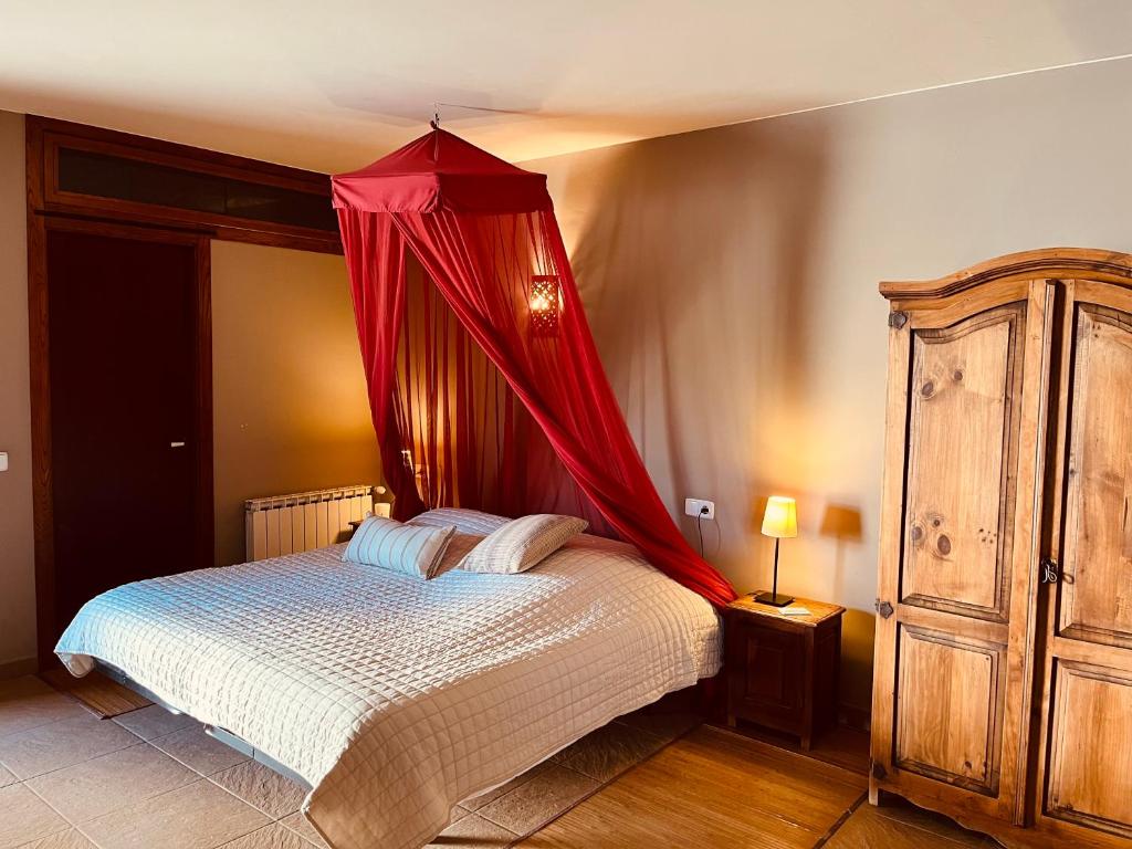 Postel nebo postele na pokoji v ubytování B&B El Ranxo