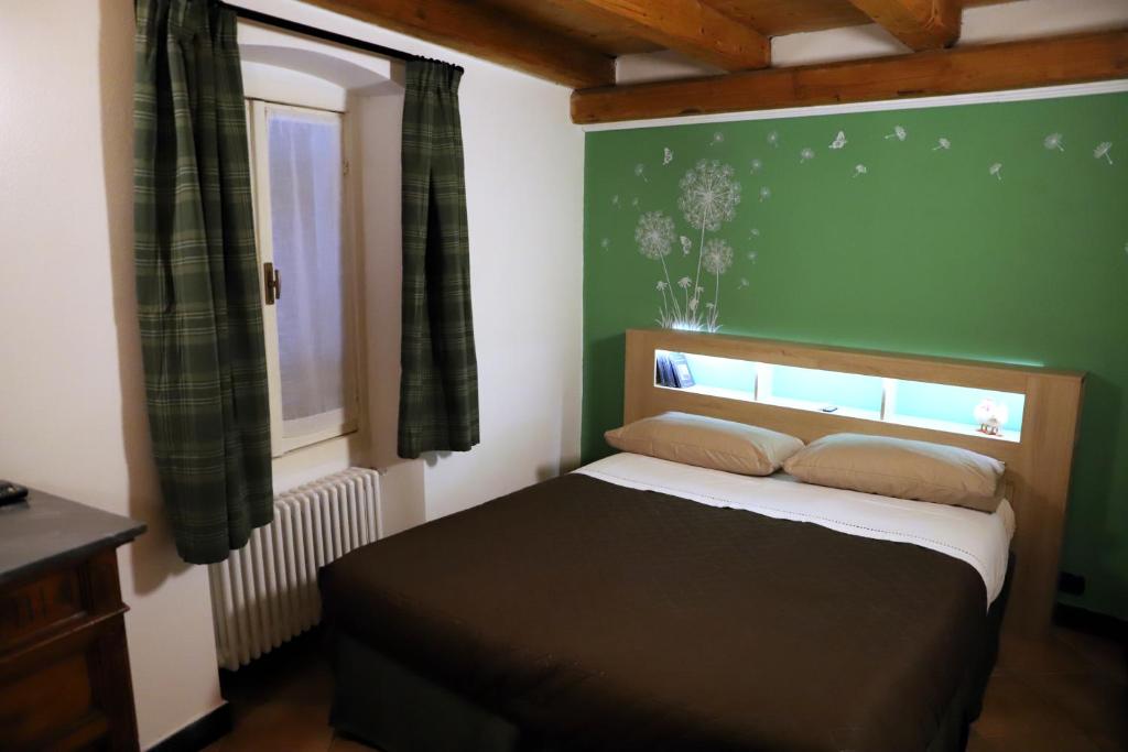 Ένα ή περισσότερα κρεβάτια σε δωμάτιο στο Dory's Tiny House