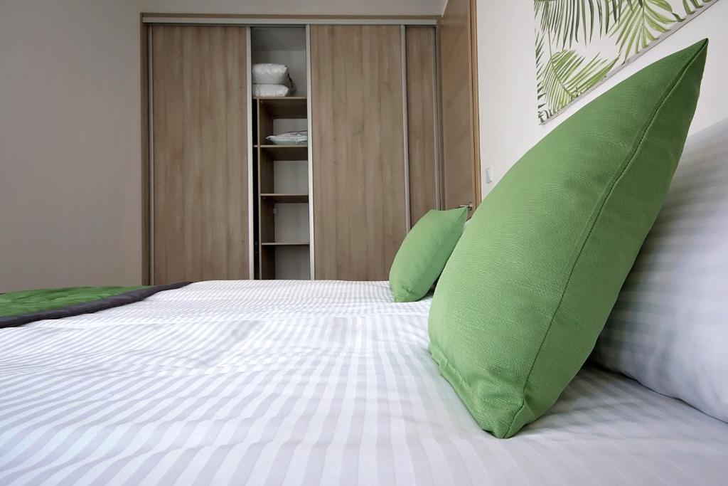 Postel nebo postele na pokoji v ubytování Enjoy Apartments
