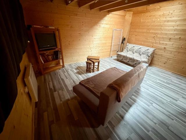 Ένα ή περισσότερα κρεβάτια σε δωμάτιο στο Idéal we, vacances travail