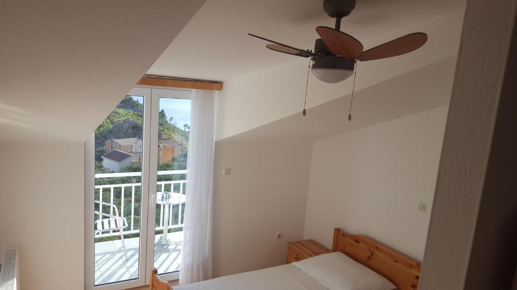 Postel nebo postele na pokoji v ubytování Guesthouse Bosankic