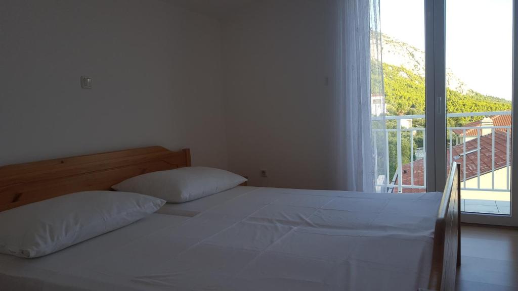 Postel nebo postele na pokoji v ubytování Guesthouse Bosankic