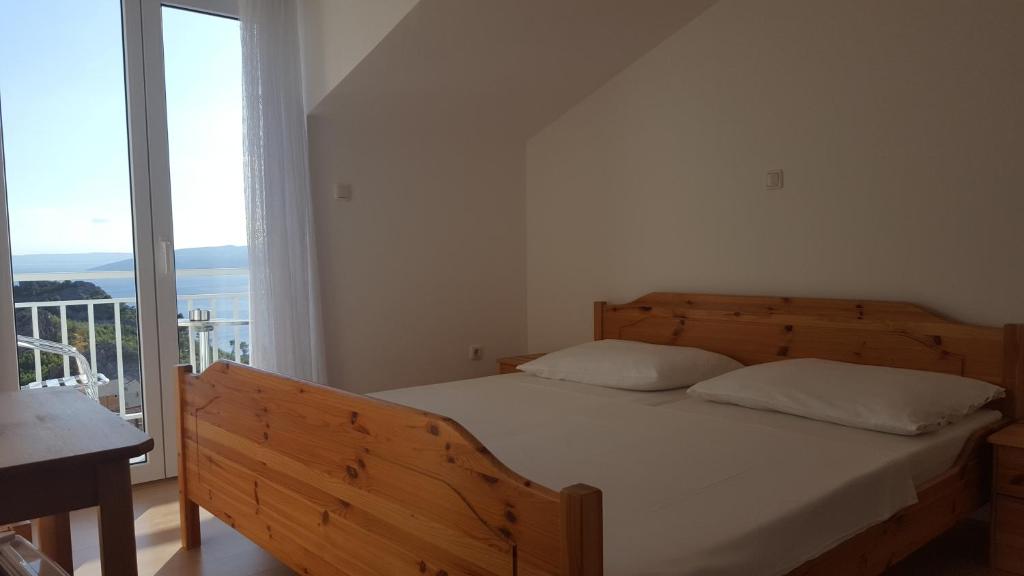 Postel nebo postele na pokoji v ubytování Guesthouse Bosankic