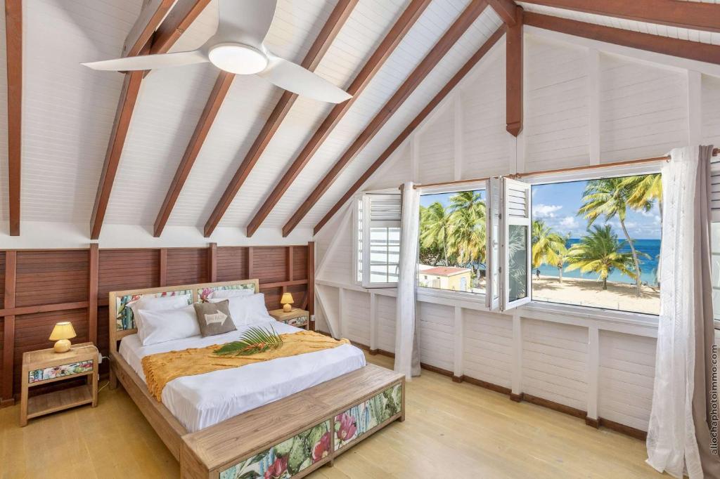 Ένα ή περισσότερα κρεβάτια σε δωμάτιο στο App 3 chambres en Duplex - Bord de plage