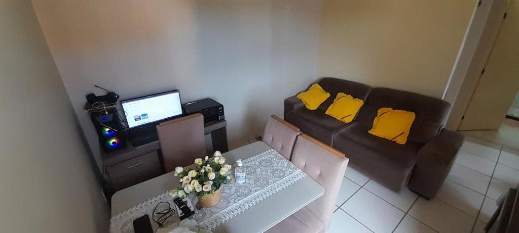 Μια τηλεόραση ή/και κέντρο ψυχαγωγίας στο condomínio sol e mar QE