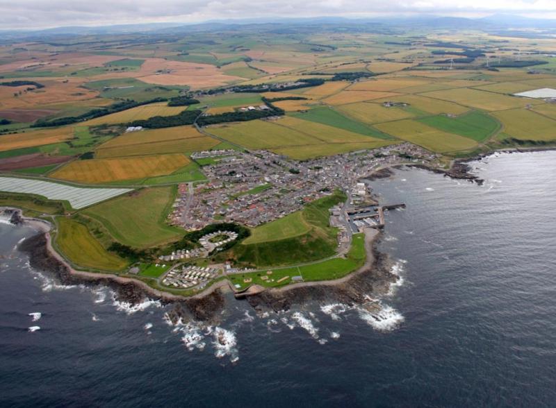 an aerial view of an island in the water at Belvedere Holiday Home in Whitehills