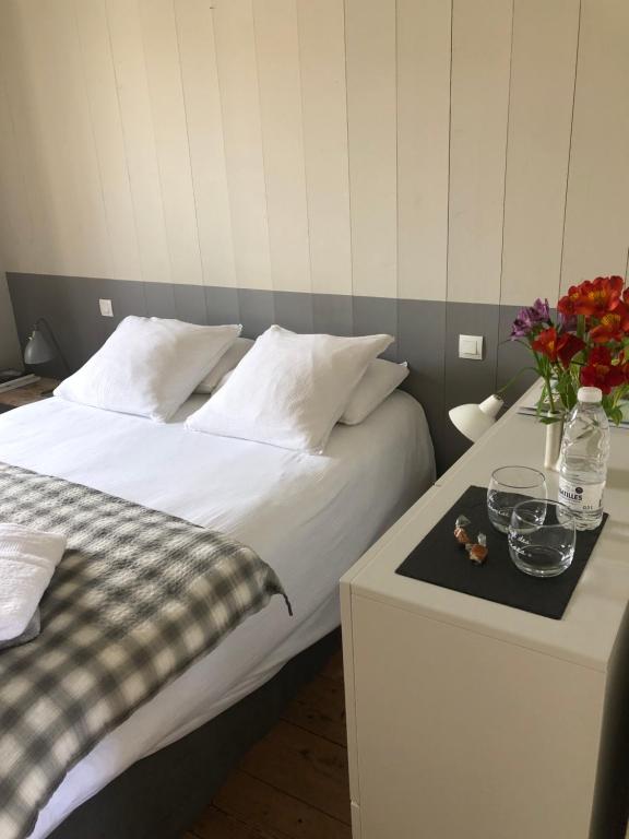 Una cama o camas en una habitación de Calone 17 Ile de Ré