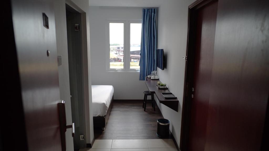 Postel nebo postele na pokoji v ubytování Hotel Cascada