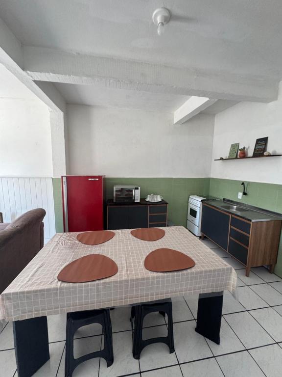 Η κουζίνα ή μικρή κουζίνα στο Loft Zona Sul próximo ao mar