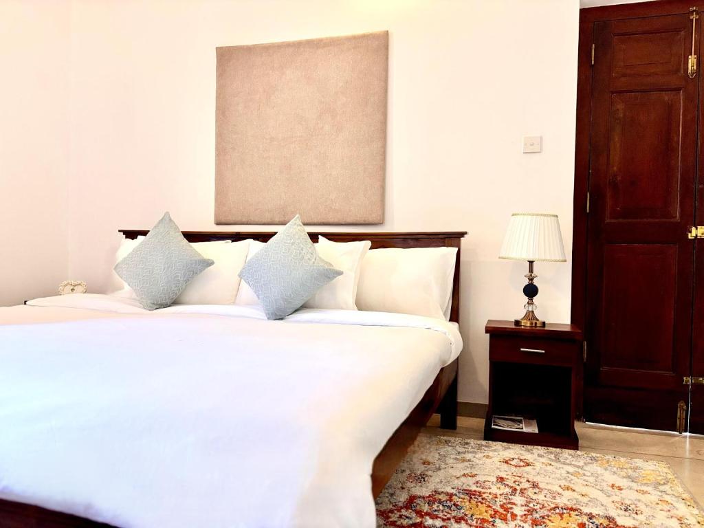 Ένα ή περισσότερα κρεβάτια σε δωμάτιο στο Nest Villas