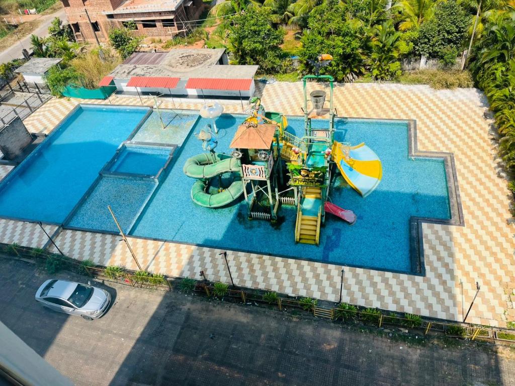 Bazén v ubytování Coastal Nest Home - Malpe Beach nebo v jeho okolí