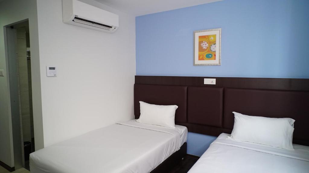 Postel nebo postele na pokoji v ubytování Hotel Cascada