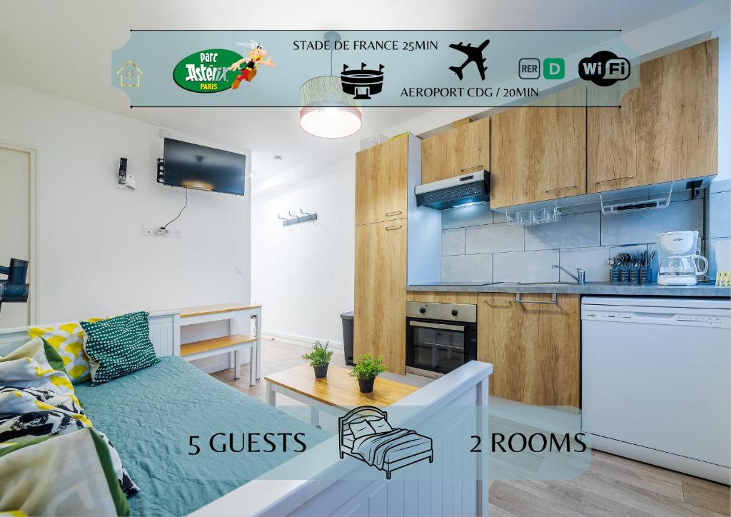 eine kleine Küche mit einem Bett in einem Zimmer in der Unterkunft The Paris 9th Sky - 8min to Paris in Saint-Denis