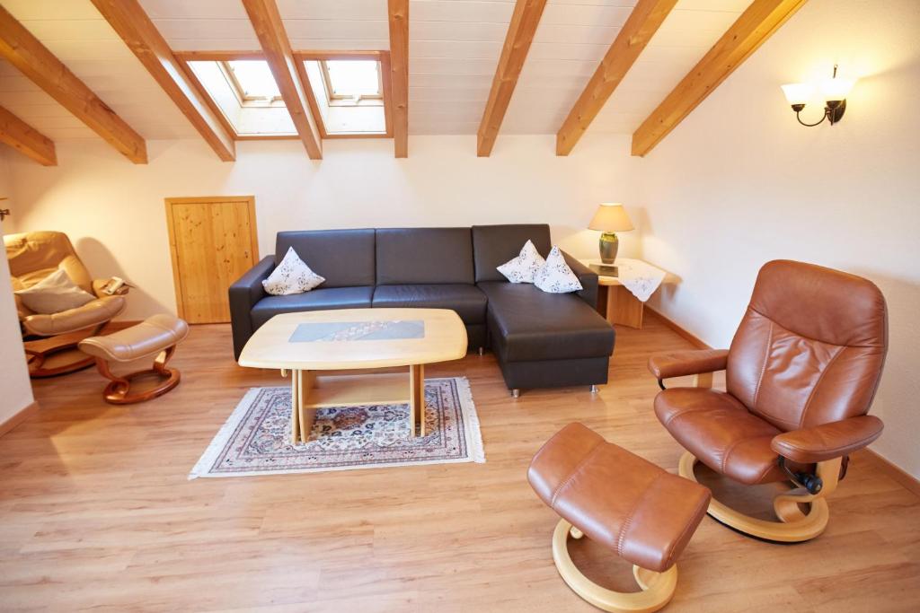 Гостиная зона в Ferienwohnung F. Füglein