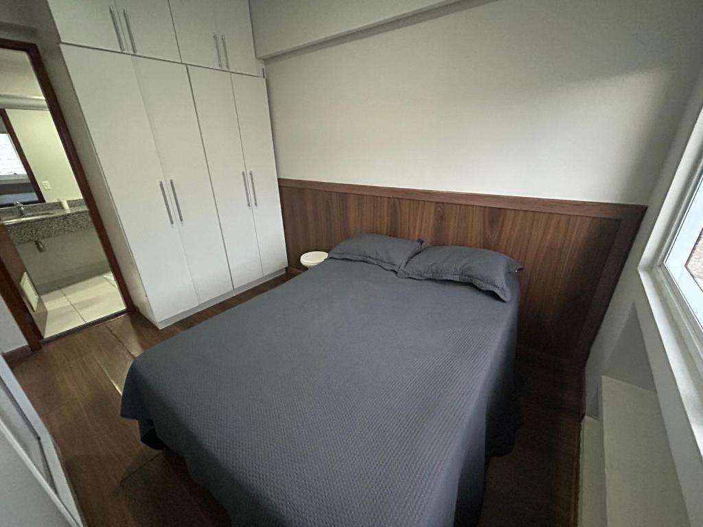 Ένα ή περισσότερα κρεβάτια σε δωμάτιο στο Hotel Mercu Beneficência Portuguesa Bela Vista 1408