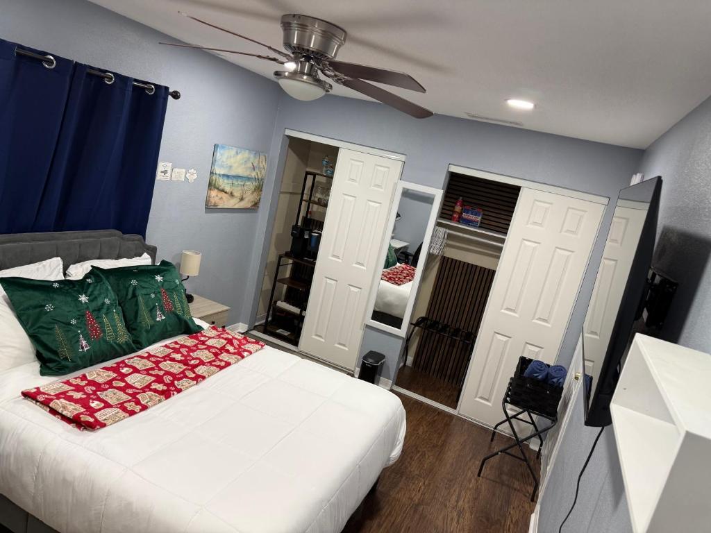 Ένα ή περισσότερα κρεβάτια σε δωμάτιο στο Signature Suite