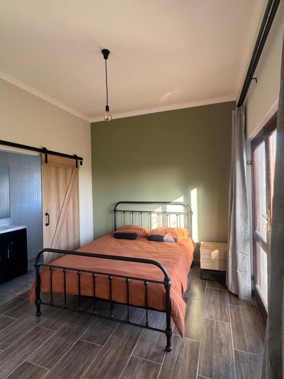 En eller flere senge i et værelse på Sea and Vlei on Disa