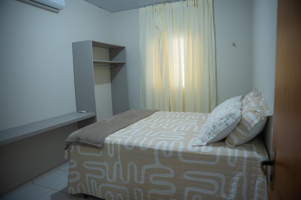 Ένα ή περισσότερα κρεβάτια σε δωμάτιο στο Casa Bosque da Serra