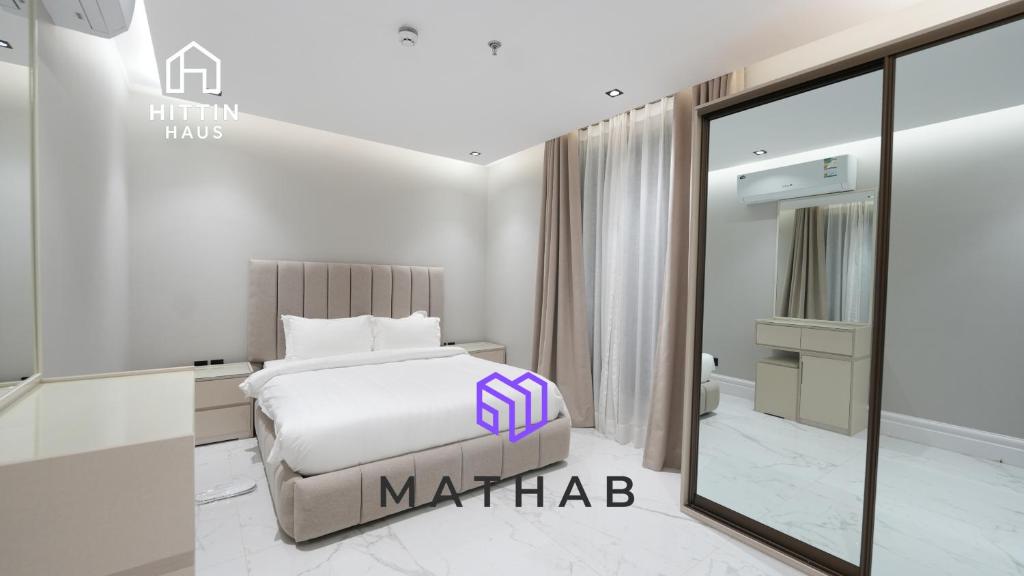 Giường trong phòng chung tại Hittin Haus