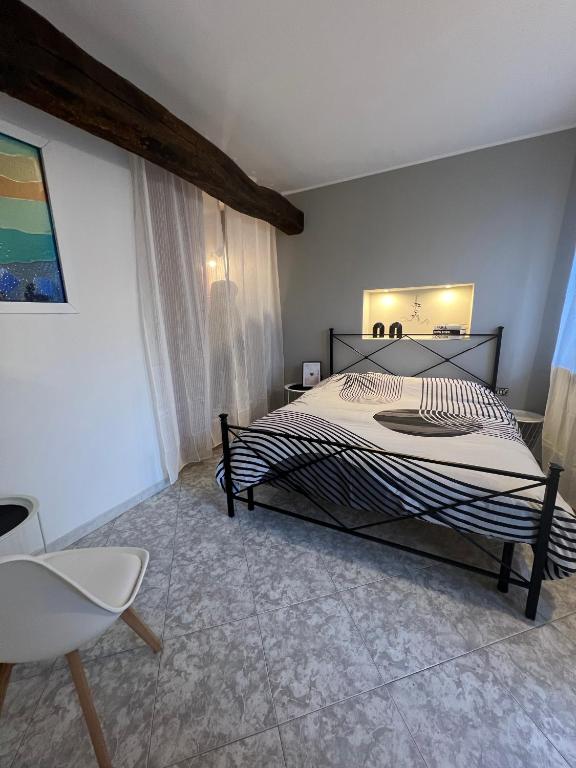 Llit o llits en una habitació de D-Living2 Casa Vigevano