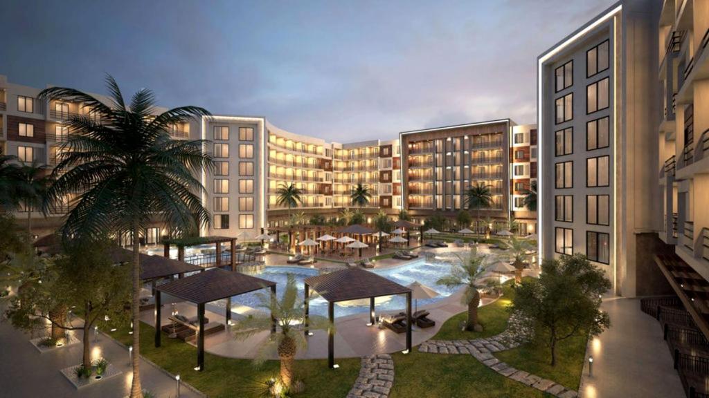 an overhead view of a hotel with a courtyard with a pool at Tiba Golden Resort in Hurghada