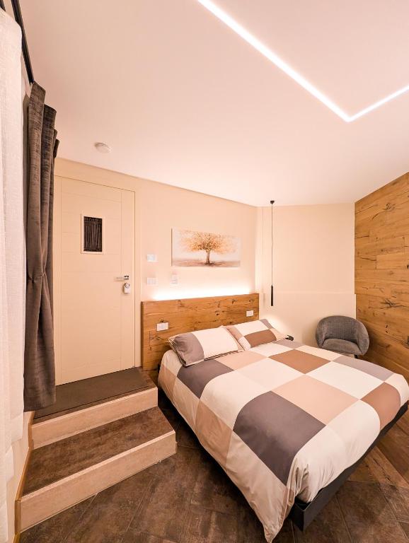 Postel nebo postele na pokoji v ubytování Lucalì Mountain Room