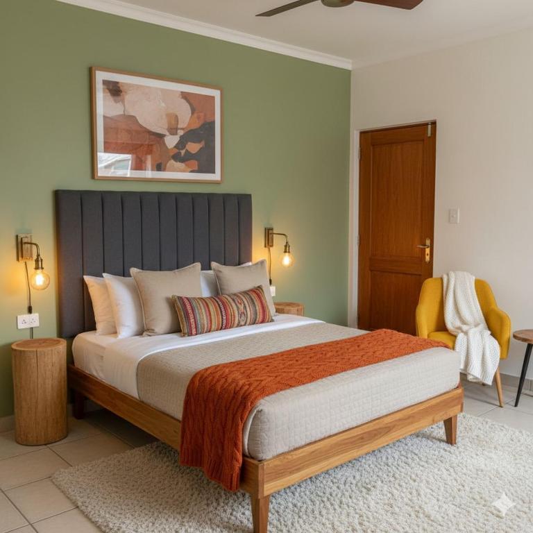 Giường trong phòng chung tại Hotel Rivlet Cyberhub Near Ambience Mall